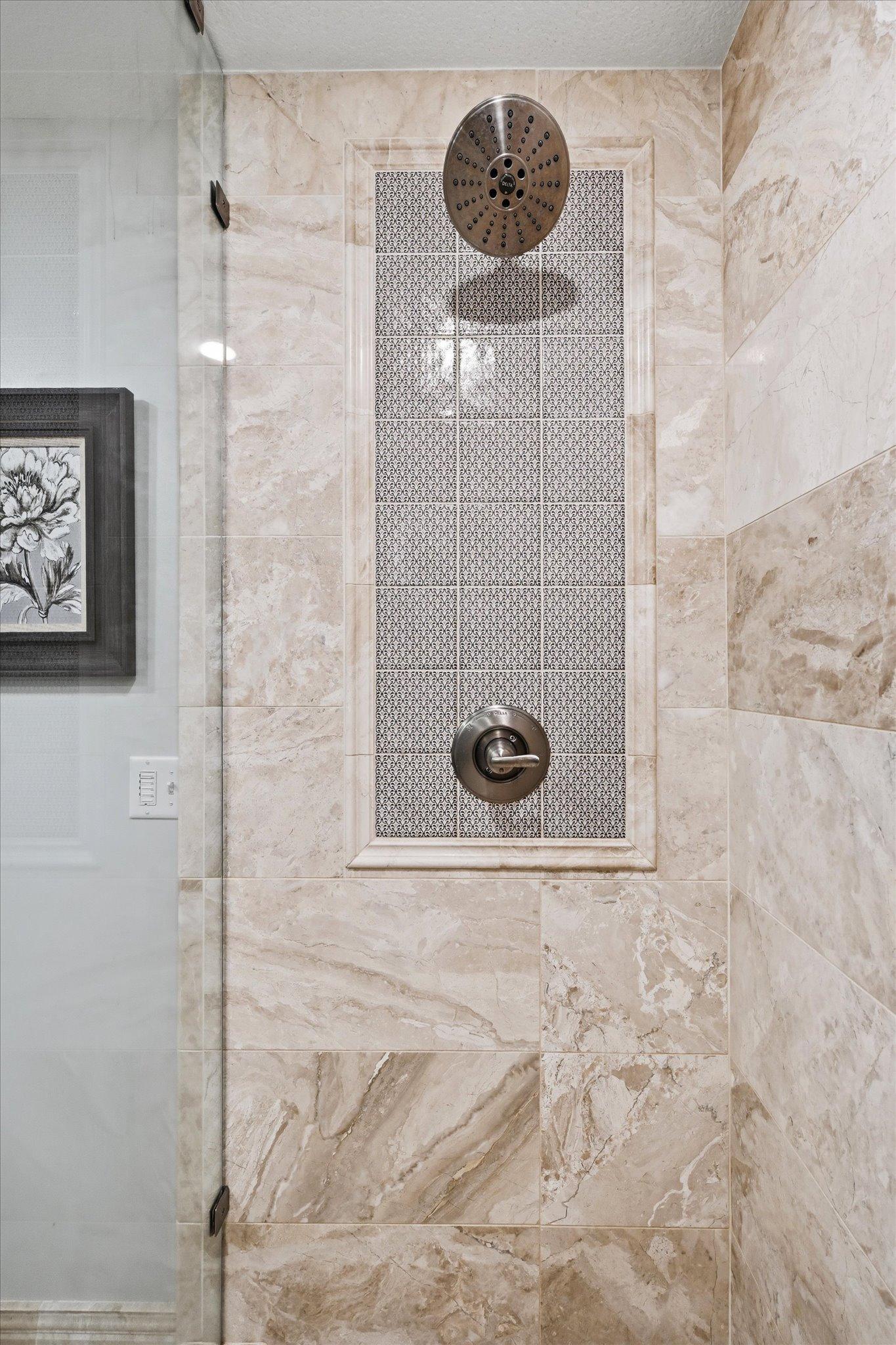 Beautiful tiled shower.