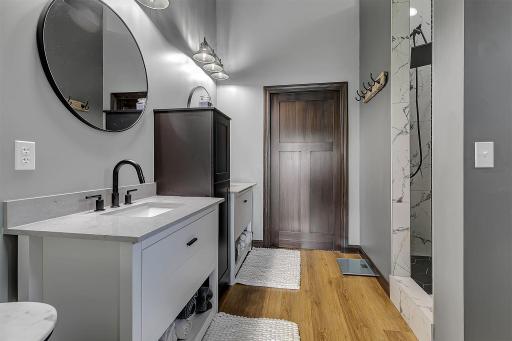 Enter walk in closet through the bathroom. Walk in shower to the right.