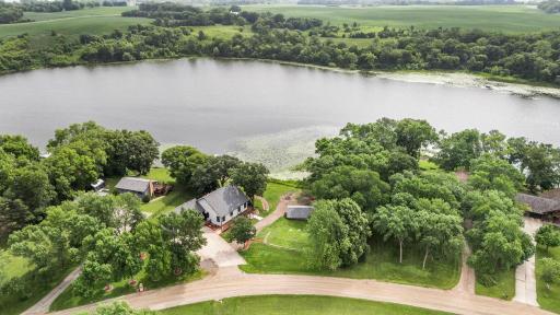 A new waterfront home with attached and detached garage