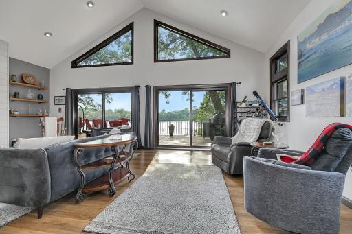 Vaulted ceilings accented by huge window scape.