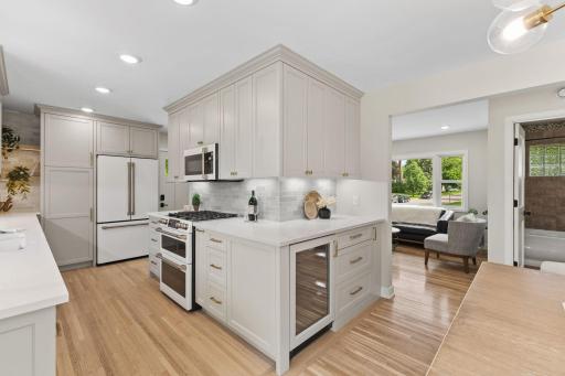 Wine fridge and extra storage thoughtfully added with the remodel.