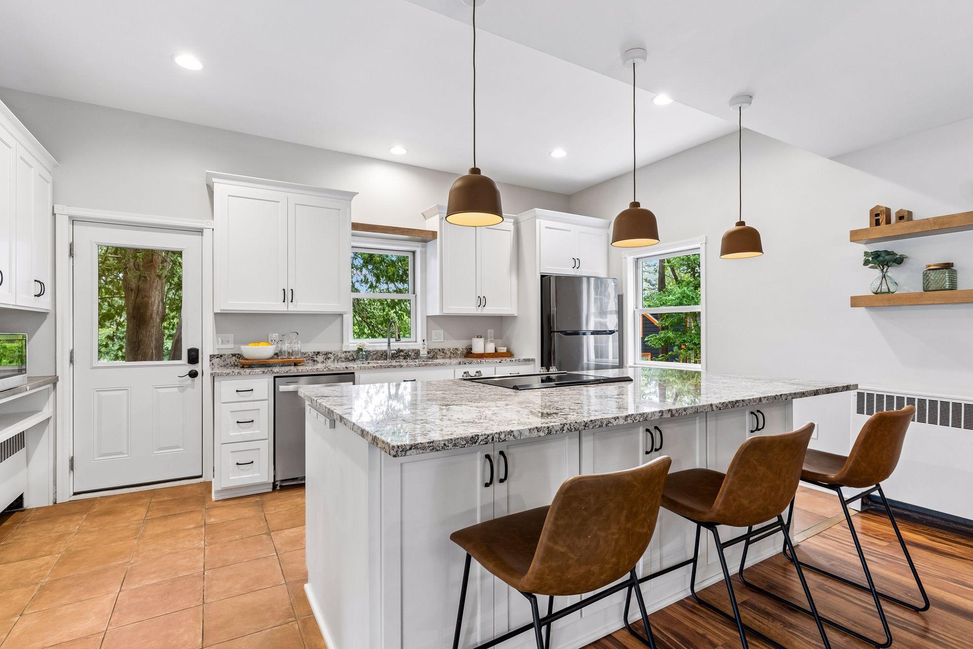 Kitchen with stone countertops and tons of storage