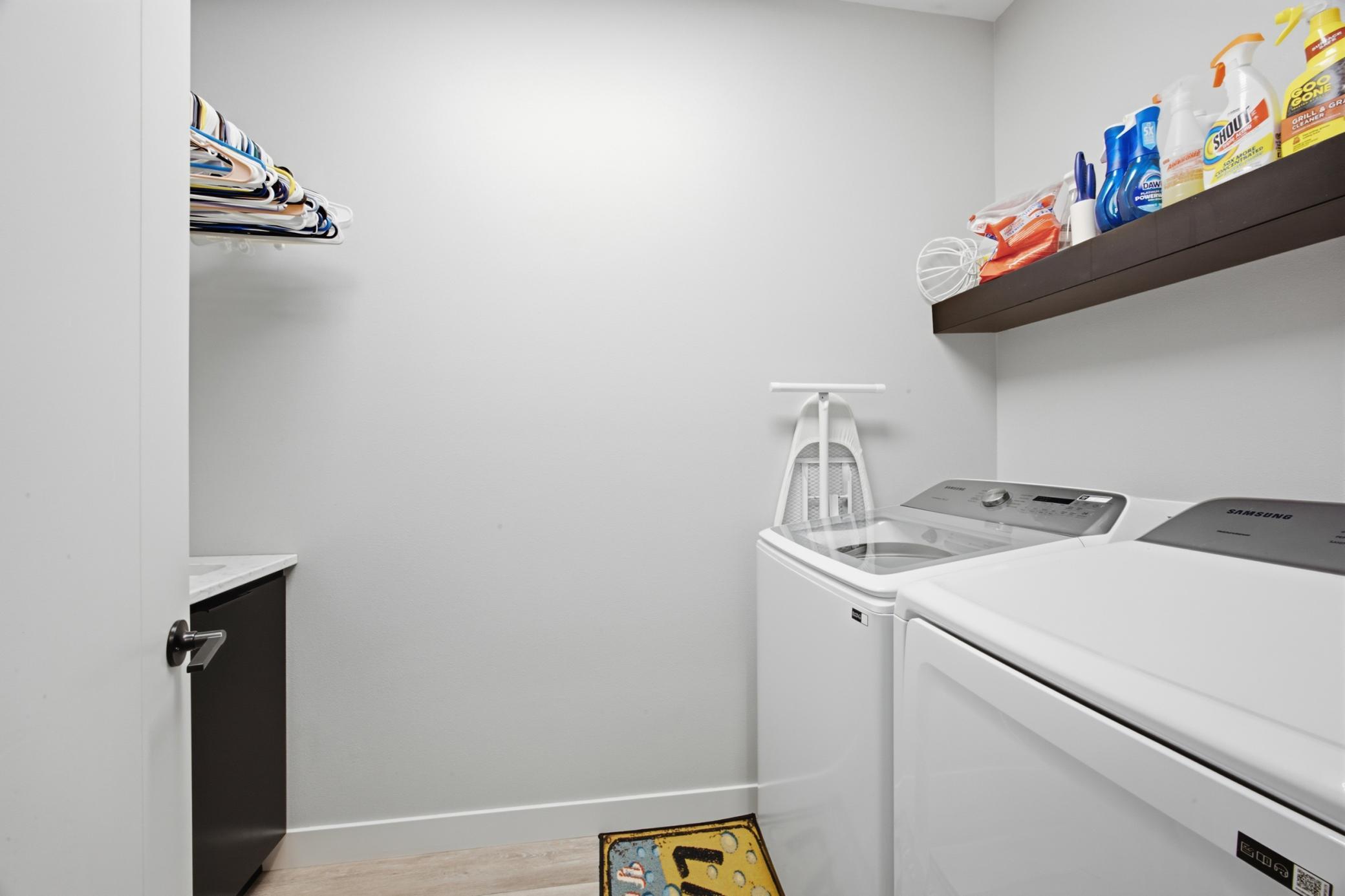 Laundry with sink and storage