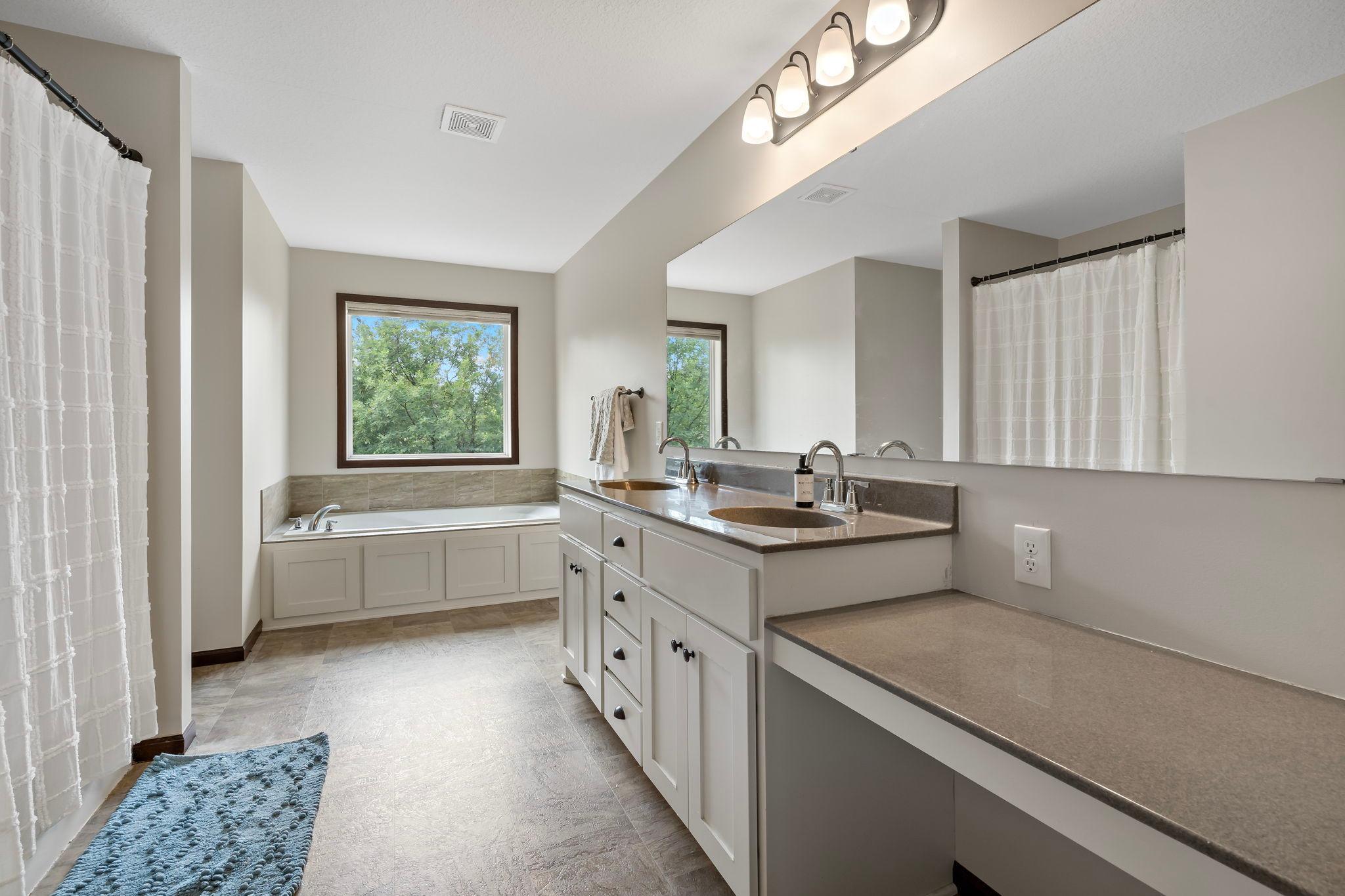 Private primary bath complete with soaking tub