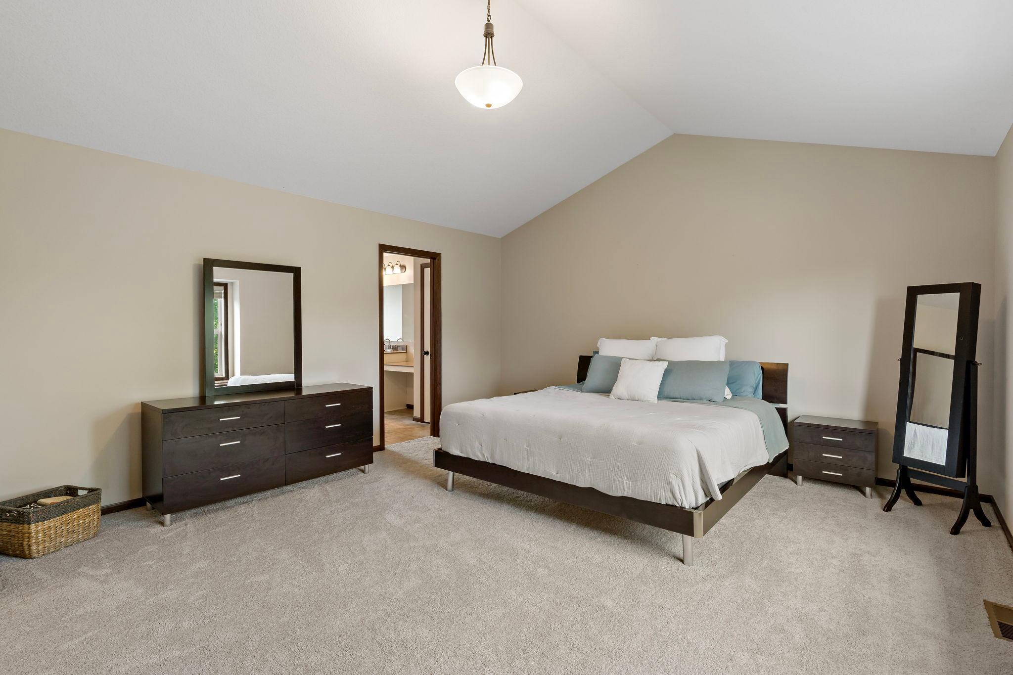 Vaulted and spacious primary bedroom