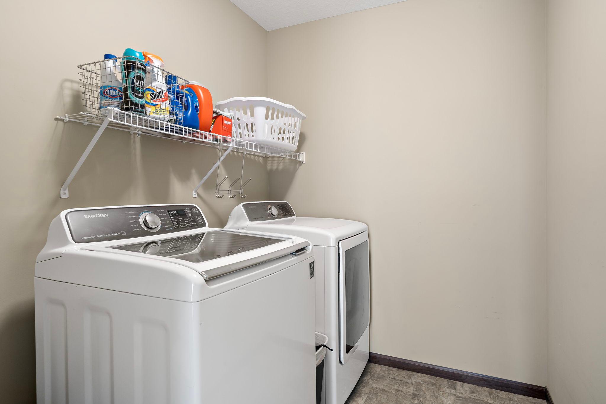 Laundry room conveniently located on the upper level