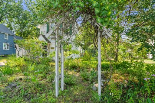This sweet trellis leads you to the first of two water features in the garden in the front yard.