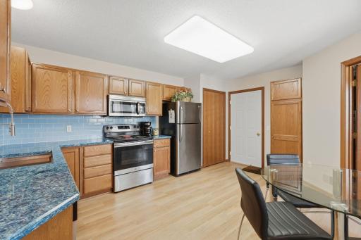 Kitchen features luxury vinyl tile flooring