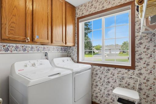 Laundry Room with shelving and a window, next to the Kitchen