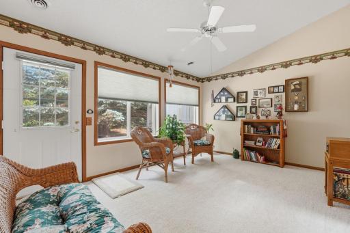 Comfortable Sunroom gives way to backyard greenery