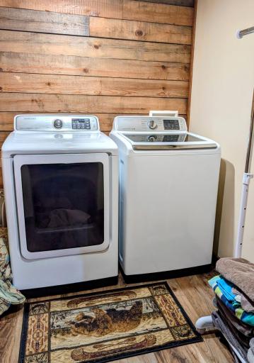Laundry room in main floor bedroom walk in closet