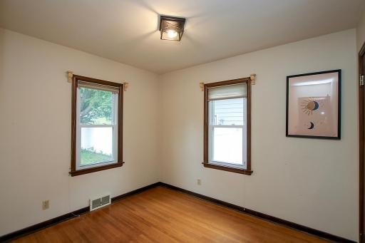 One of the two main level bedrooms, with beautiful hardwood floors as well!