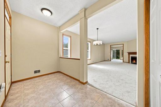 The welcoming foyer is spacious and features easy care ceramic tile flooring.