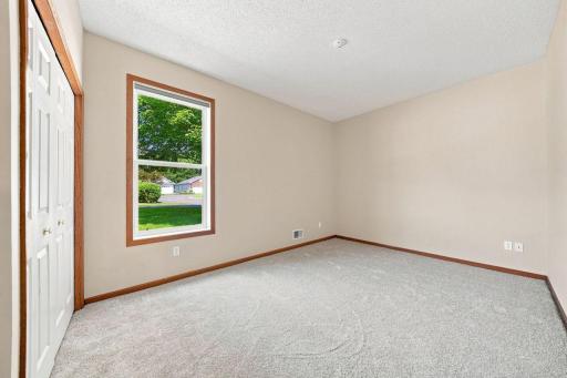 Adjoining the primary bedroom is this "flex" area. Imagine the possibilities...office, den, hobby area, nursery, or enclose for a 3rd bedroom! Yes, there is a closet here!