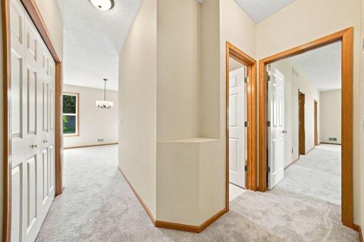 Custom closet systems offer excellent storage potential in 2 large closets in the hallway leading to the bedroom wing.