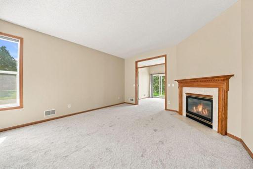 Living room with transom window to sunroom
