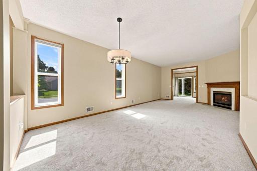 The sunroom opens to the living/dining rooms