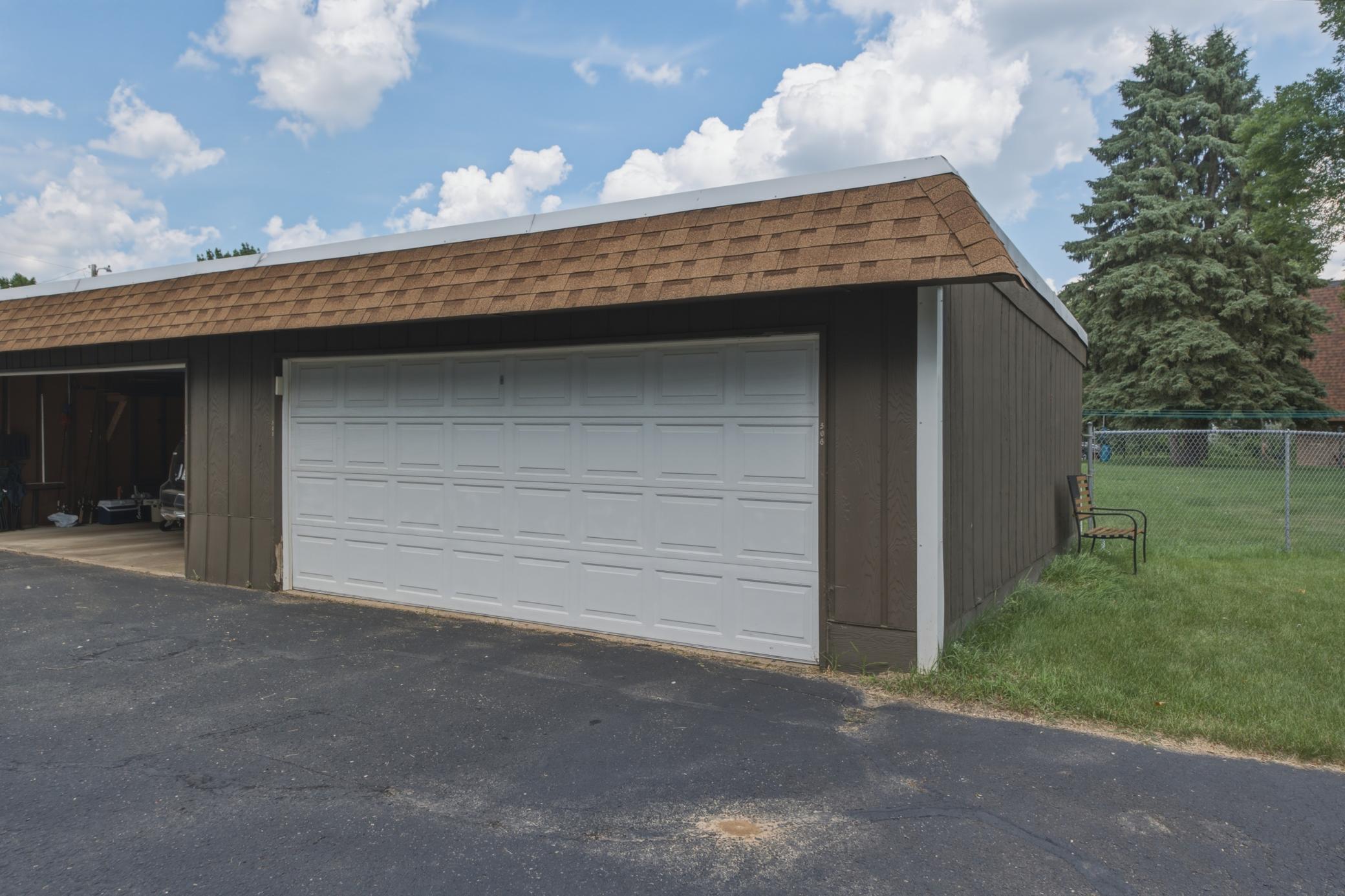 This unit has access to the right side of this garage and shares with unit #305.