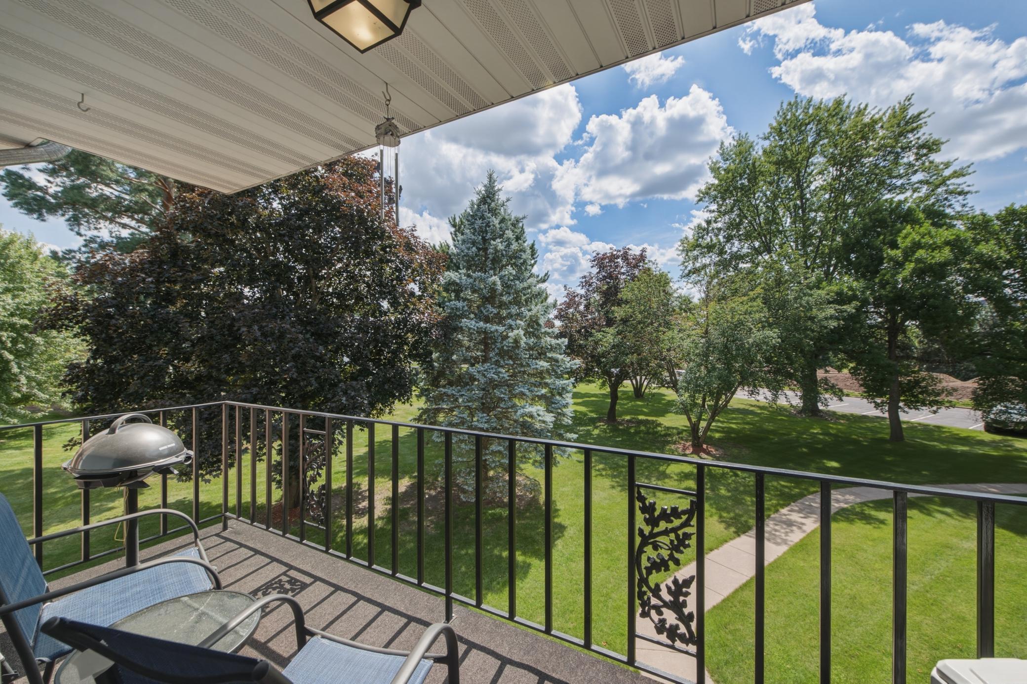 Enjoy your tranquil surroundings as you look out over the yard towards the front of the building. There is space for a sitting area on the balcony to enjoy the sunshine.