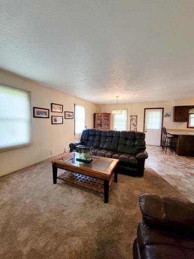 Upper level living room combined with dining