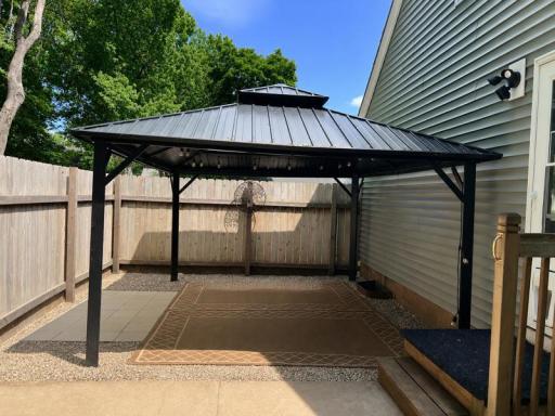 Spend summer evenings enjoying family meals under the steel gazebo.
