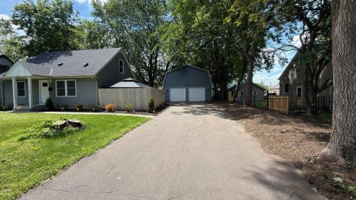 The large, detached 4 car, 2 story garage is a rare find, perfect for car enthusiasts, hobbies, additional storage, and more!