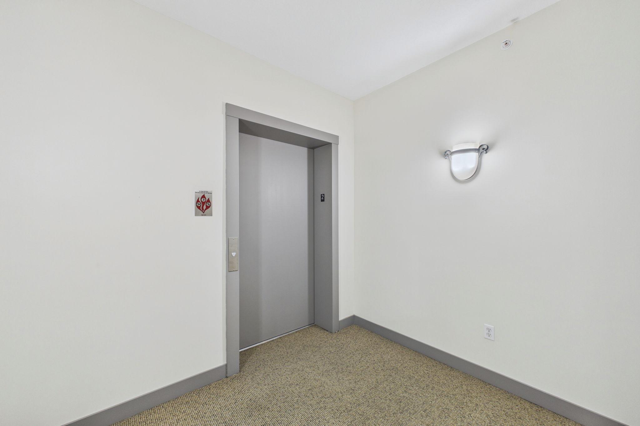 Elevator to garage and within short steps of the back entrance to the condo