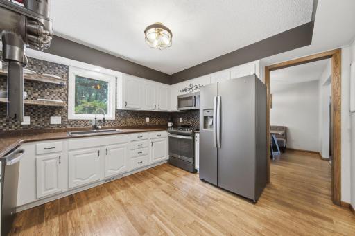 Dining room has easy access to updated kitchen.
