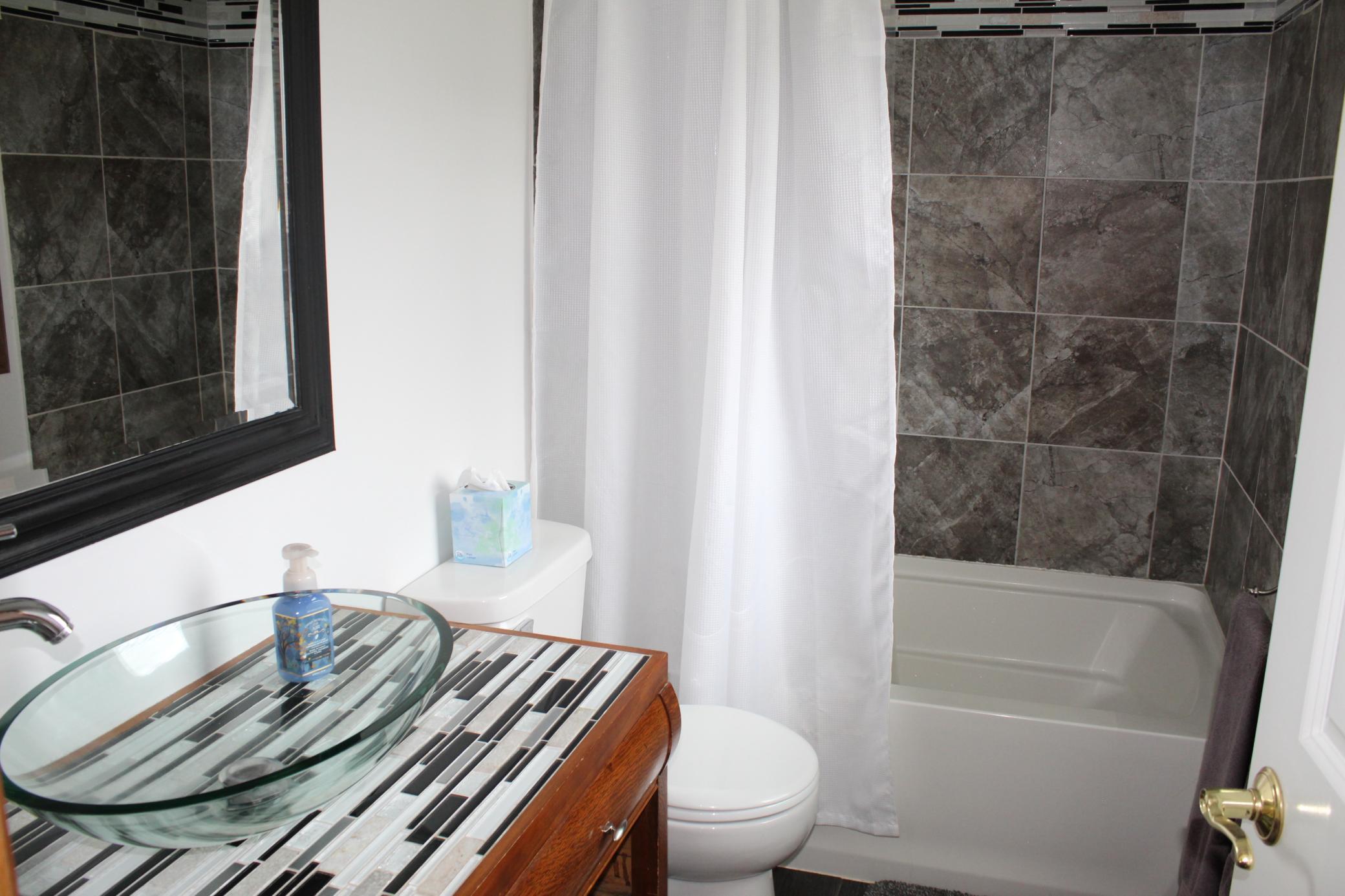 Primary Private Bathroom Tiled shower