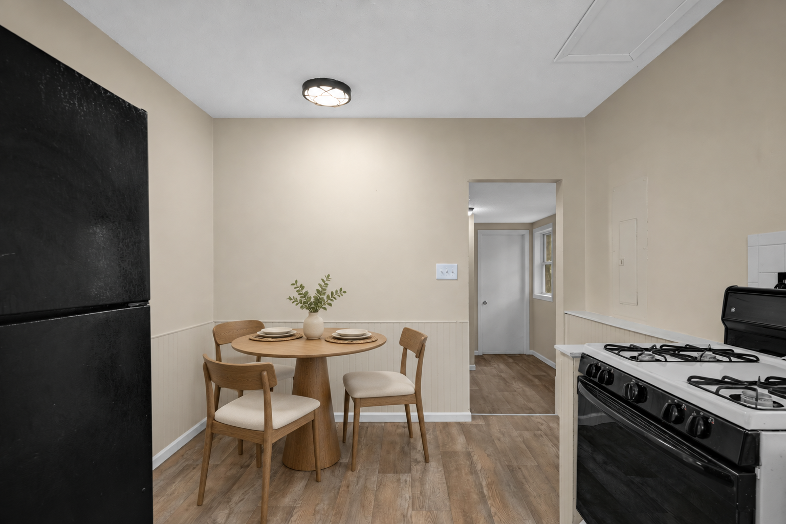 Photo has been virtually staged for illustrative purposes - Dining Room.png