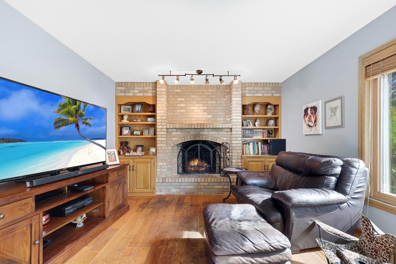 Such a cozy spot for those MN winters...built-ins and accent lighting