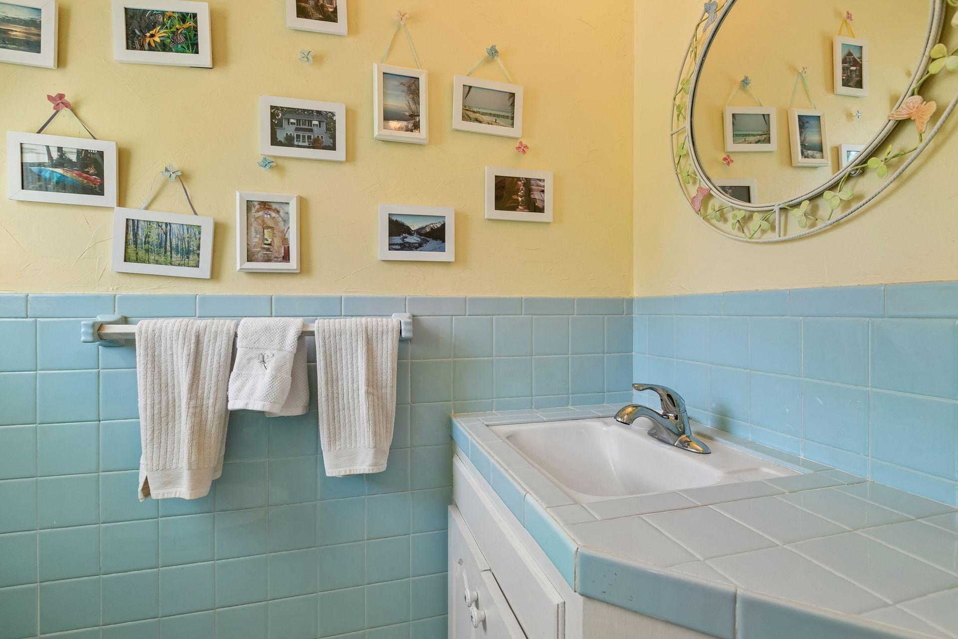 Check out this vintage well-maintained 1/2 bath on the main floor! So cute!~