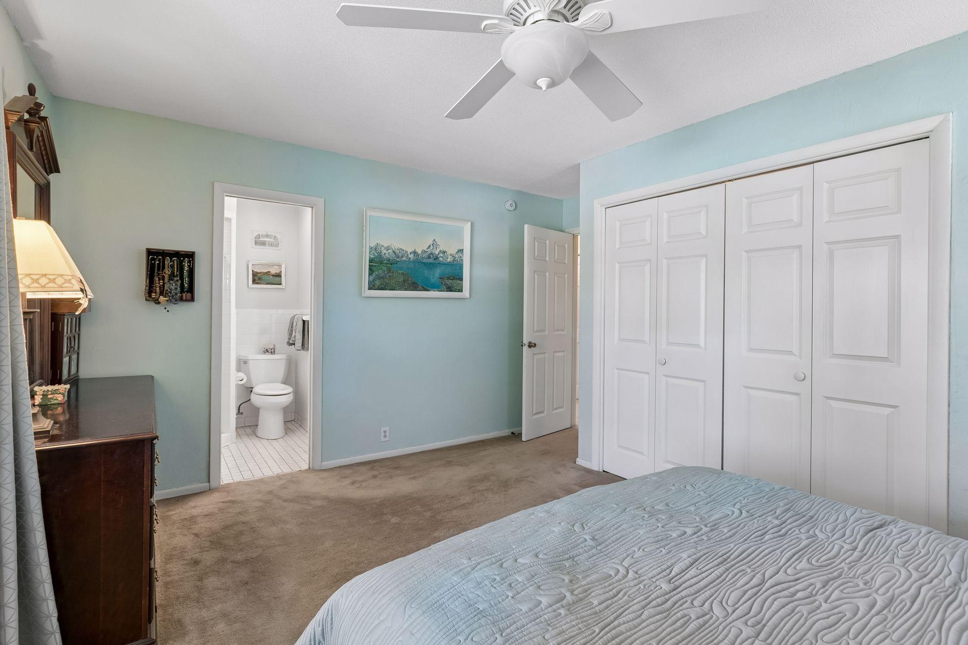 A convenient 1/2 bath adjoins the primary suite
