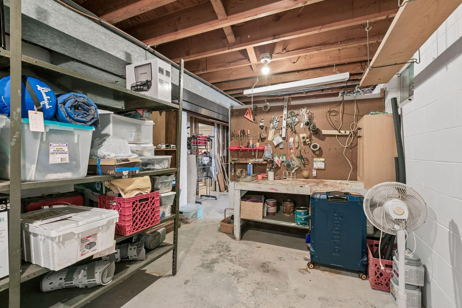 The utility room has so much room for storage and shop work