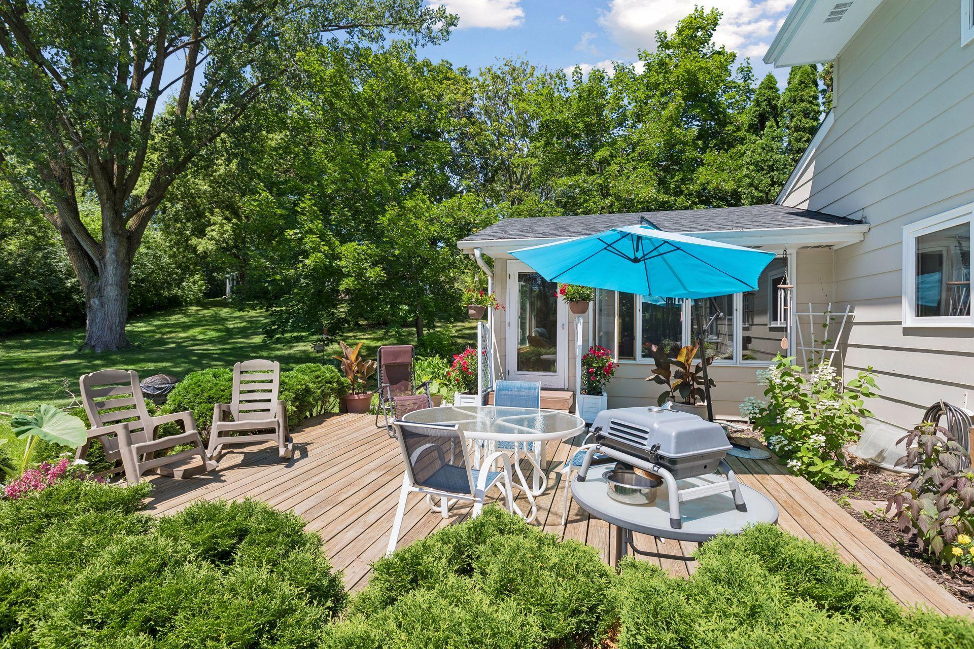 The deck extends from the 4-season porch for seamless flow for great entertaining space