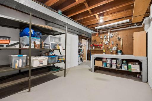 Additional lower level space is great for storage or a home shop!