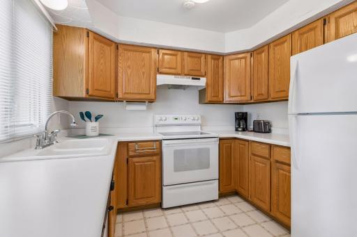 Light, bright kitchen with a nice amount of counter space and storage.