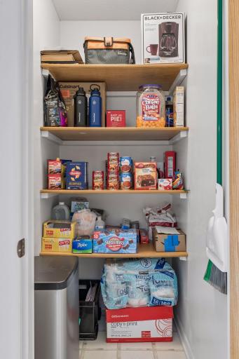 The walk-in pantry off the dining room could be converted into a main floor stacked-unit washer/dryer laundry room!