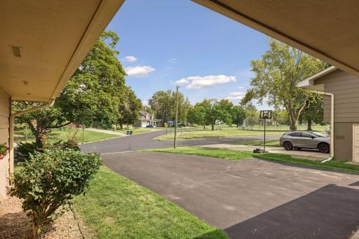 View of driveway and towards the park....from the covered entrance to home.
