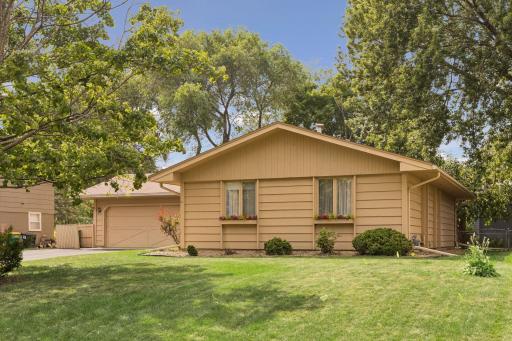 This spacious home is set across the street from Lions Park!
