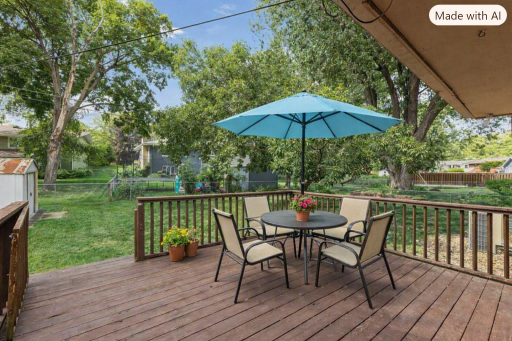 The back deck is perfect for entertaining. Virtually staged.