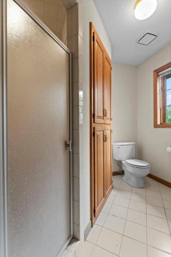 Separate from the primary bath vanity space, is private