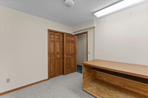 Lower Level 5th Bedroom, formally sewing and craft room