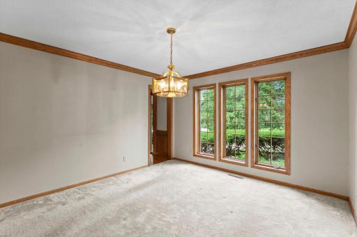 Entertain Family Friends and Colleages in the formal living room, with double doors closing off the kitchen space from your guests