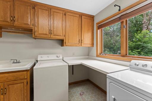 Bright and Sunny Main Floor Laundry convieniently located right off the garage entry