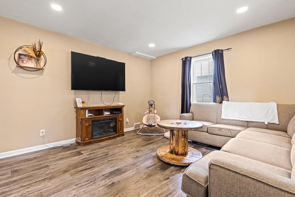 Living room is right off of the dining room - great for entertaining and keeping your family and friends connected