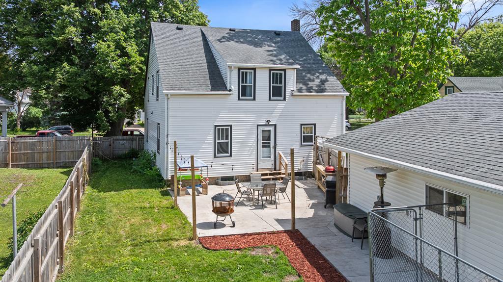 Super fun patio space off the back of the home beckoning endless summer barbecues!