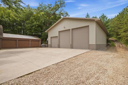 Property includes the 44' x 54' pole building with two 12' x 14' overhead doors and Wirsbo in-floor heat; and a 1,584-square-foot smaller shed with four overhead doors.