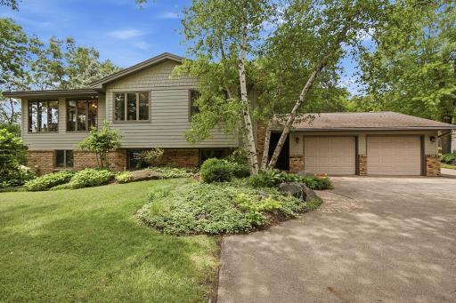 Meticulously maintained one-owner home with James Hardie siding and Renewal by Andersen windows.