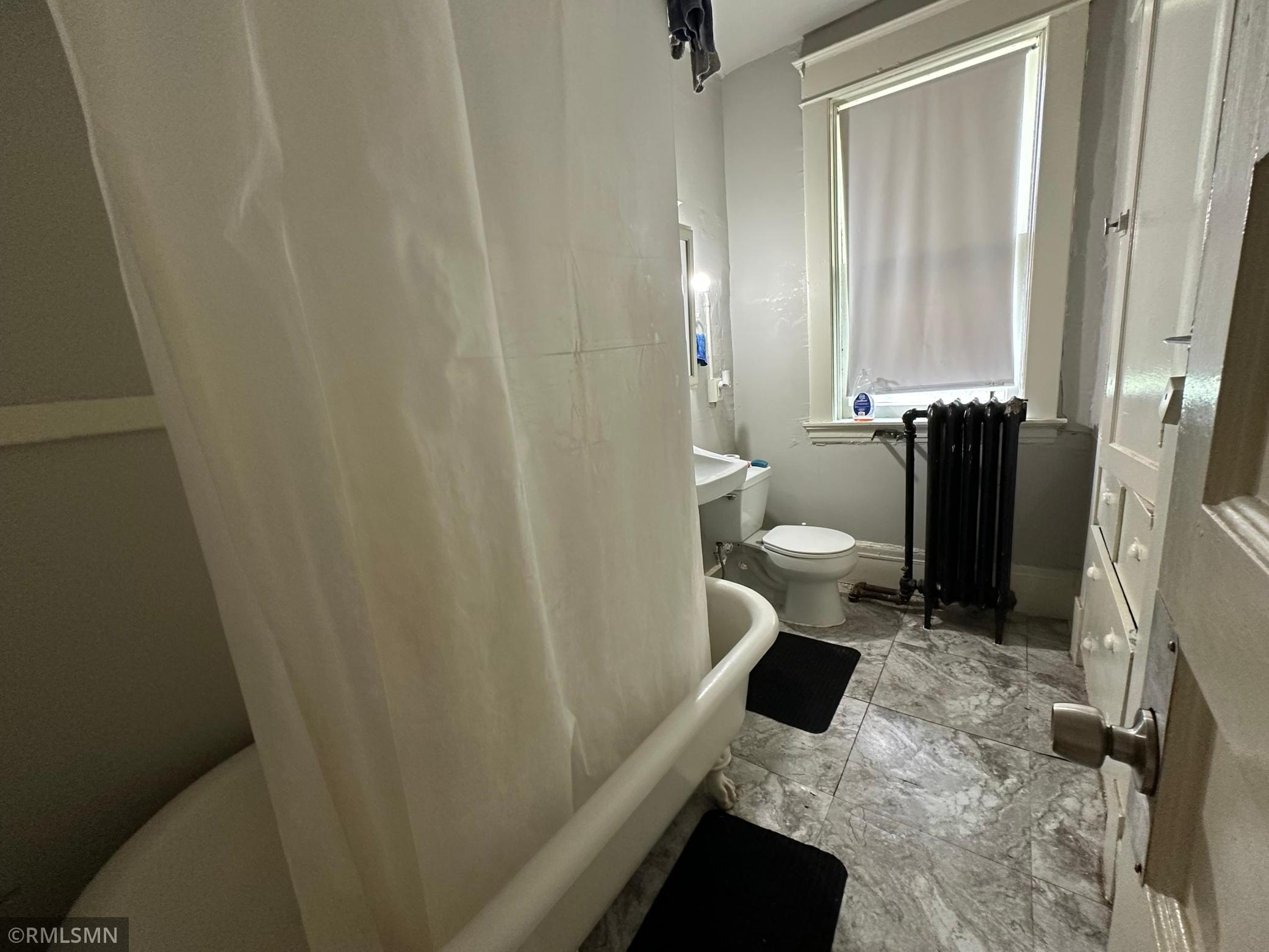 Apt 1 - bathroom has clawfoot tub
